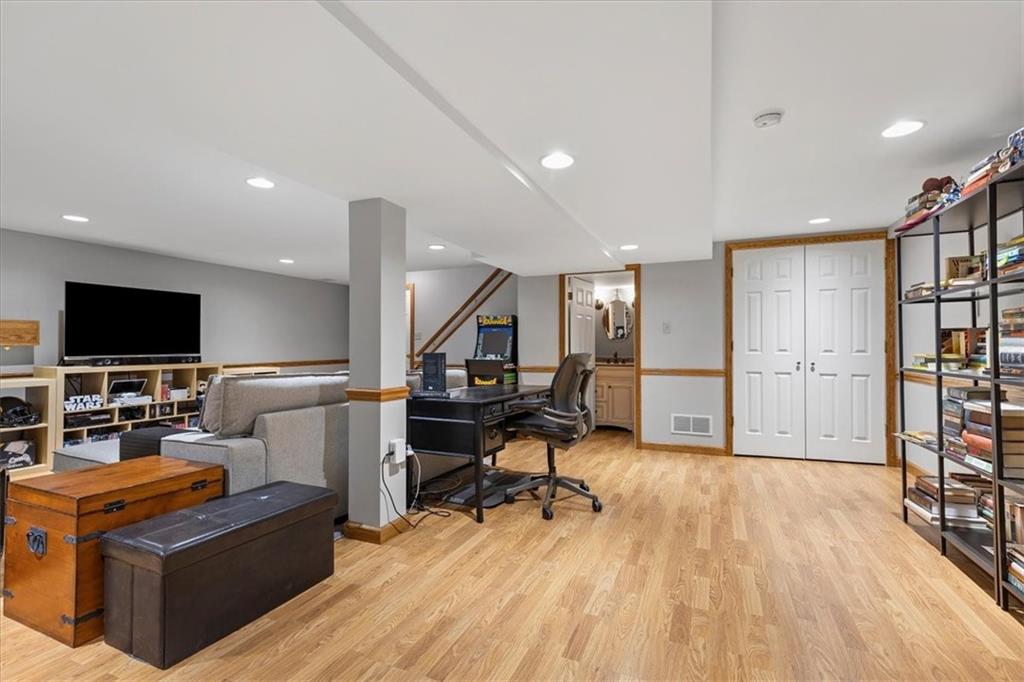 1220 Rolling Meadow Road Pittsburgh, PA 15241 - Photo 30 of 46 a living room with furniture and a flat screen tv