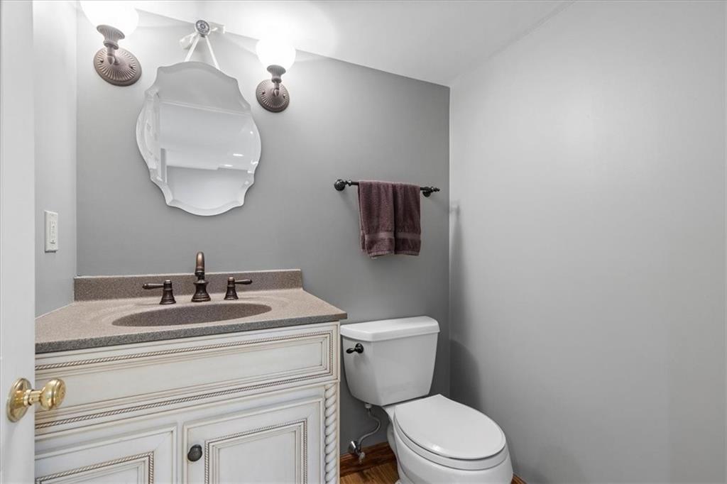 1220 Rolling Meadow Road Pittsburgh, PA 15241 - Photo 32 of 46 a bathroom with a toilet sink and mirror