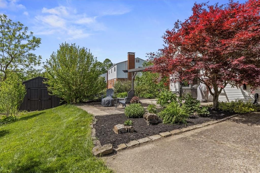 1220 Rolling Meadow Road Pittsburgh, PA 15241 - Photo 34 of 46 a front view of a house with garden