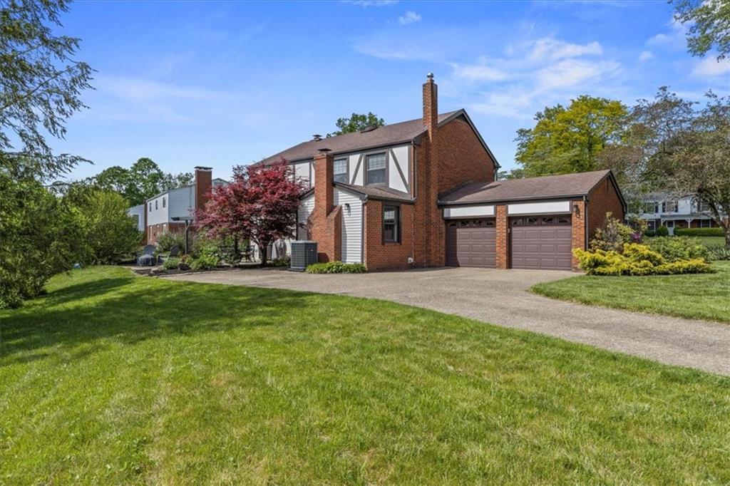 1220 Rolling Meadow Road Pittsburgh, PA 15241 - Photo 37 of 46 a front view of a house with a yard