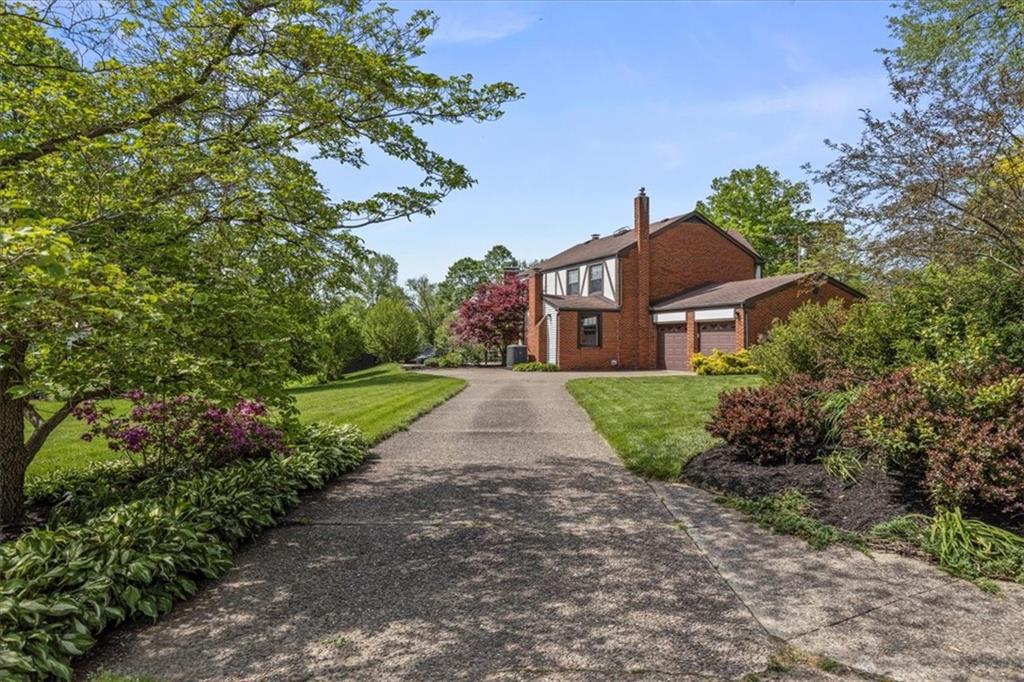 1220 Rolling Meadow Road Pittsburgh, PA 15241 - Photo 38 of 46 a view of a house with a yard