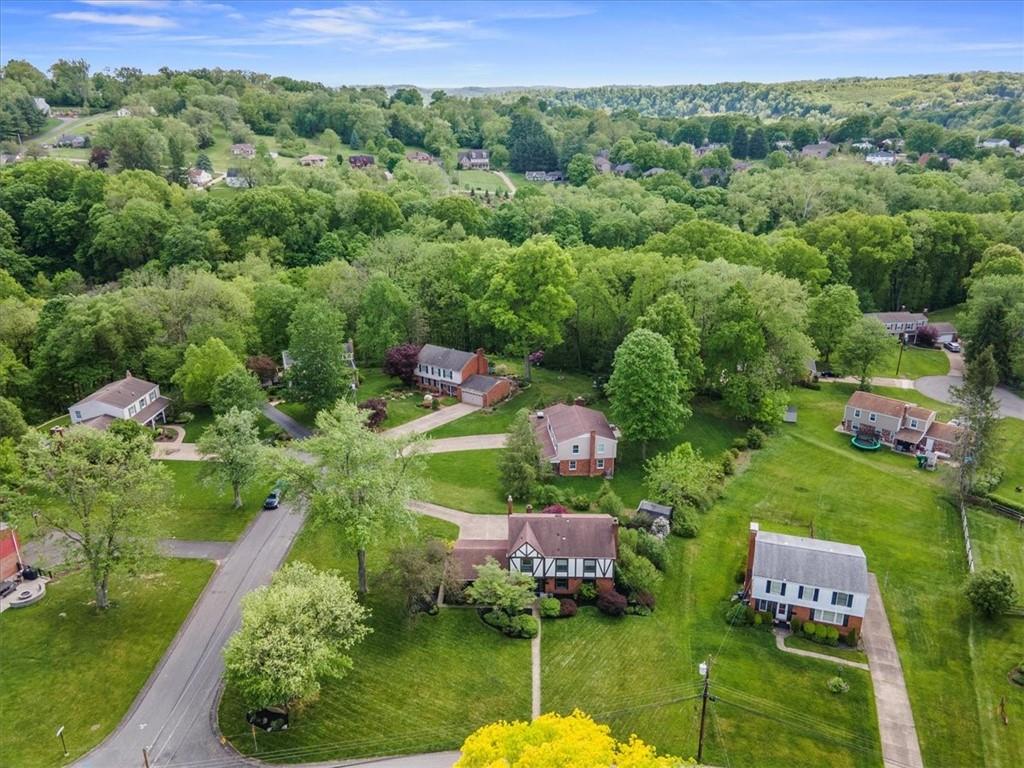 1220 Rolling Meadow Road Pittsburgh, PA 15241 - Photo 46 of 46 a view of a garden with a building in the background
