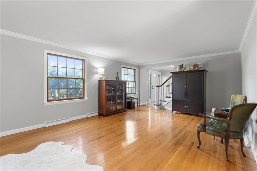 1220 Rolling Meadow Road Pittsburgh, PA 15241 - Photo 6 of 46 a view of a livingroom with furniture and a flat screen tv
