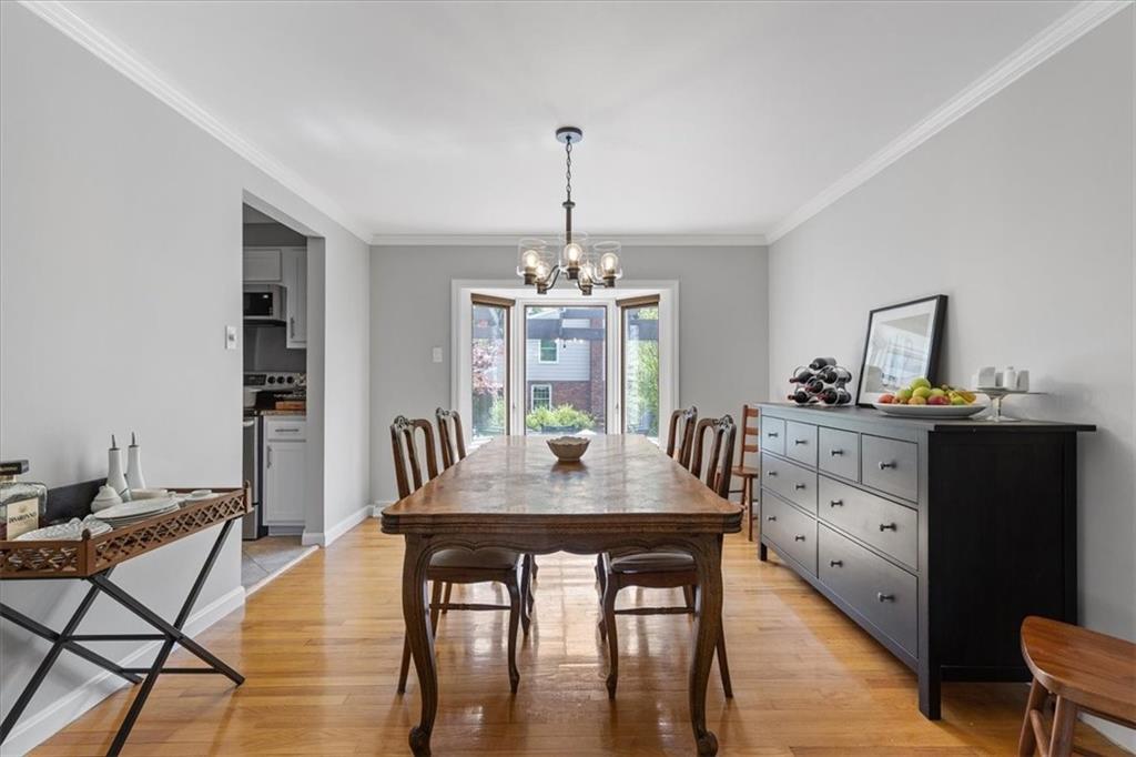 1220 Rolling Meadow Road Pittsburgh, PA 15241 - Photo 7 of 46 a dining room with furniture window and wooden floor