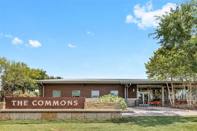 a view of swimming pool with an outdoor seating