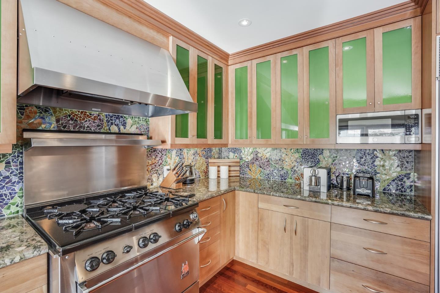4001 Marshall Avenue San Mateo, CA 94403 - Photo 35 of 88 a kitchen with granite countertop a stove and a sink