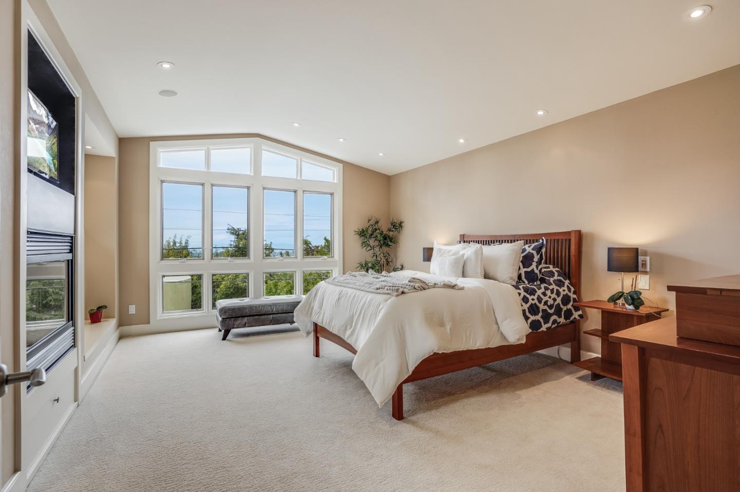 4001 Marshall Avenue San Mateo, CA 94403 - Photo 47 of 88 a spacious bedroom with a bed and a large window