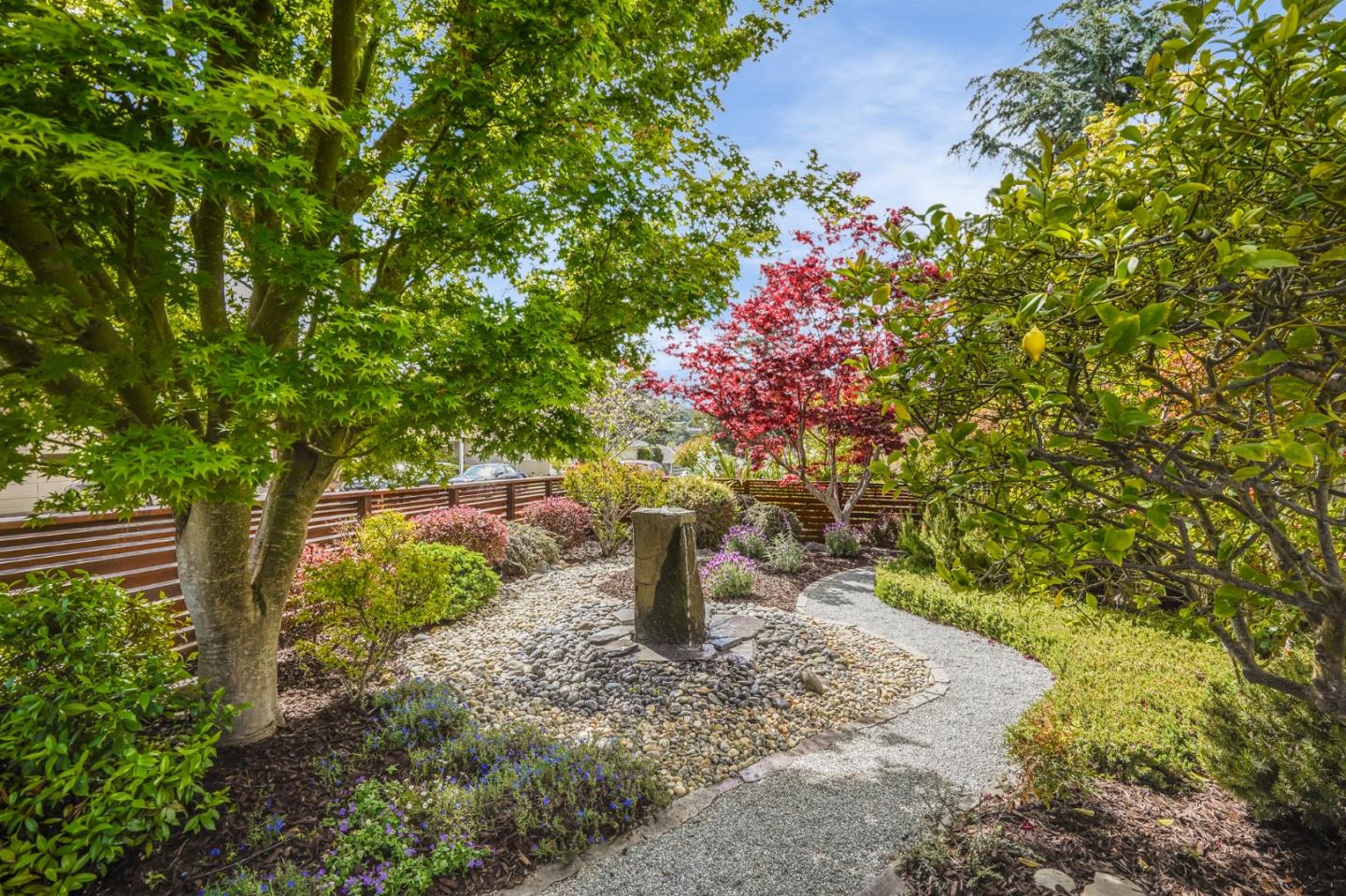 4001 Marshall Avenue San Mateo, CA 94403 - Photo 5 of 88 a front view of a house with a tree