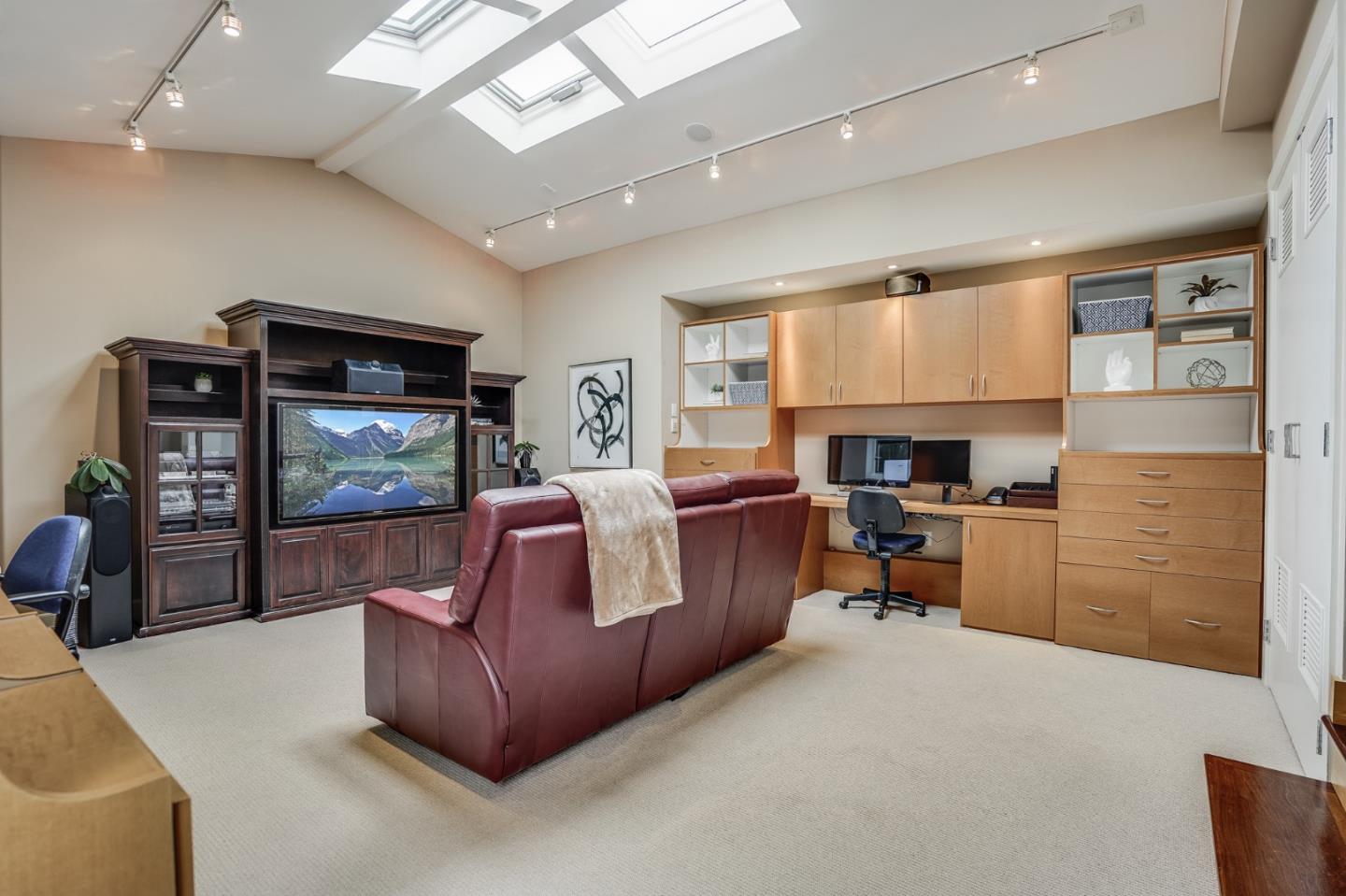 4001 Marshall Avenue San Mateo, CA 94403 - Photo 54 of 88 a living room with furniture and a flat screen tv