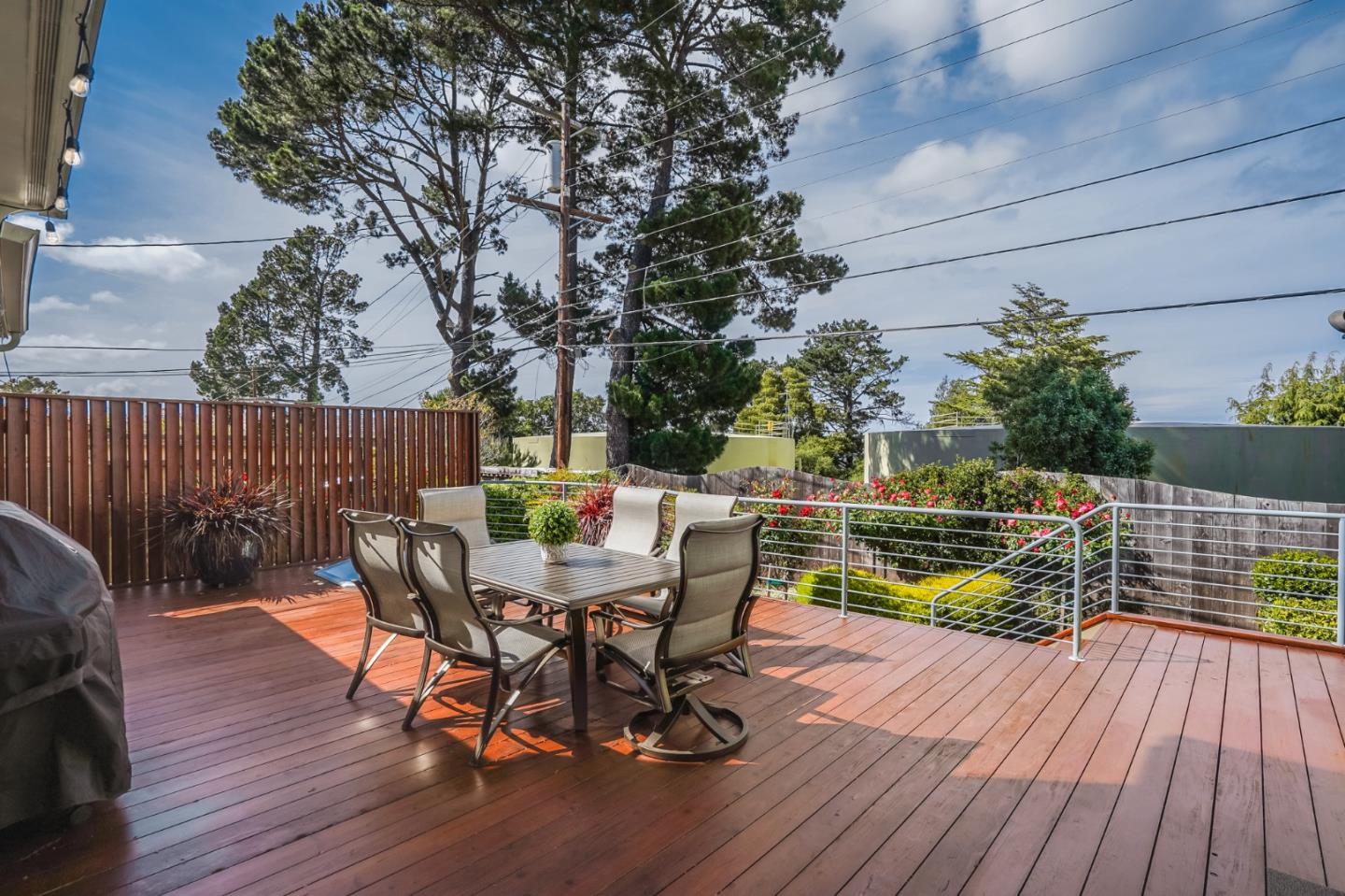 4001 Marshall Avenue San Mateo, CA 94403 - Photo 73 of 88 a view of a chairs and table on the wooden deck