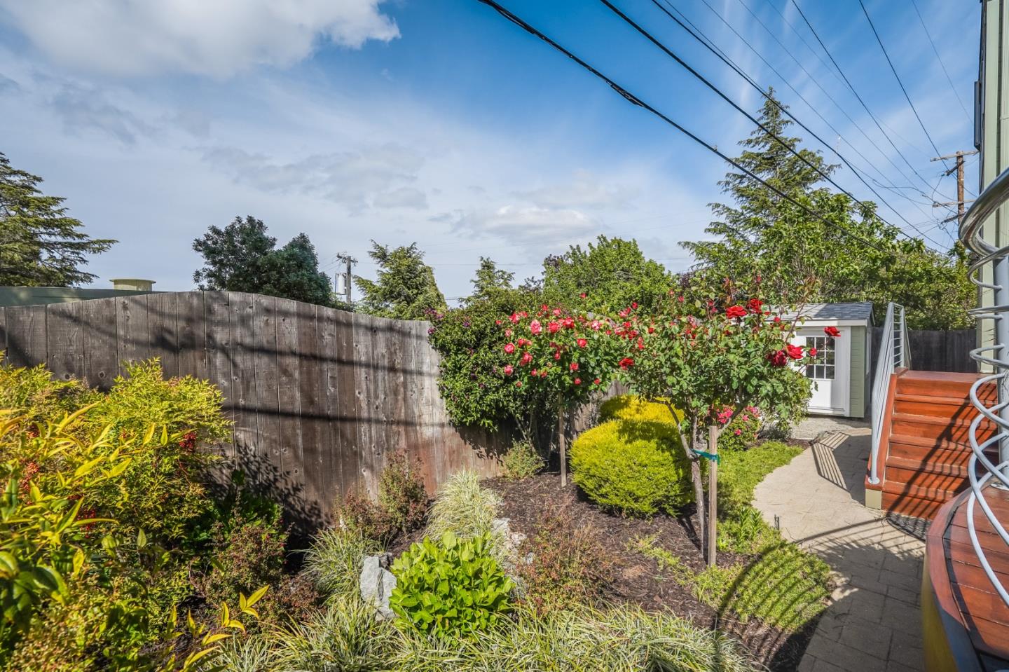 4001 Marshall Avenue San Mateo, CA 94403 - Photo 75 of 88 a backyard of a house with lots of green space