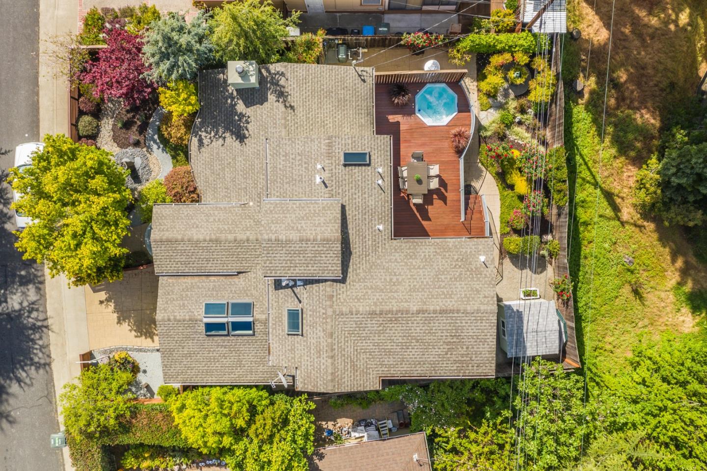 4001 Marshall Avenue San Mateo, CA 94403 - Photo 86 of 88 an aerial view of a house with a yard and garden