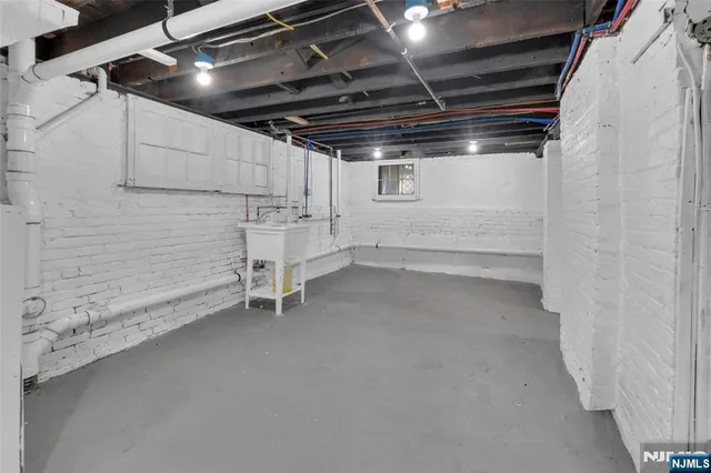 a view of an empty room with racks on the wall