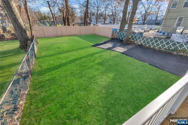 a view of a backyard with a garden