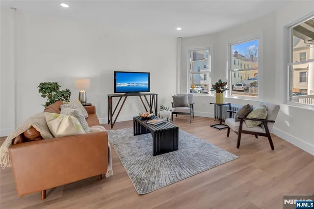 a living room with furniture and a couch