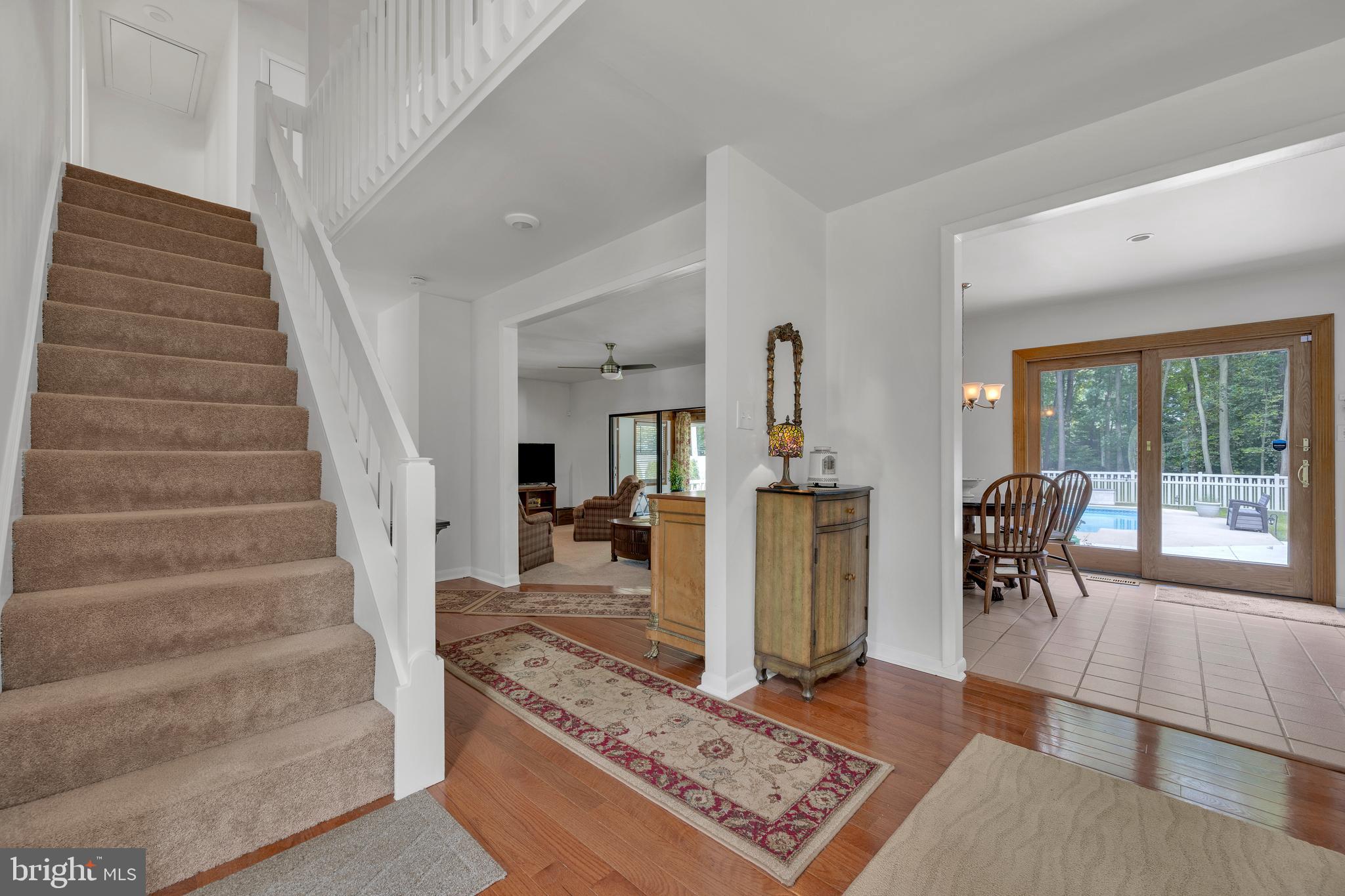 292 Pond Road Millsboro, DE 19966 - Photo 25 of 66 a living room with furniture and a rug
