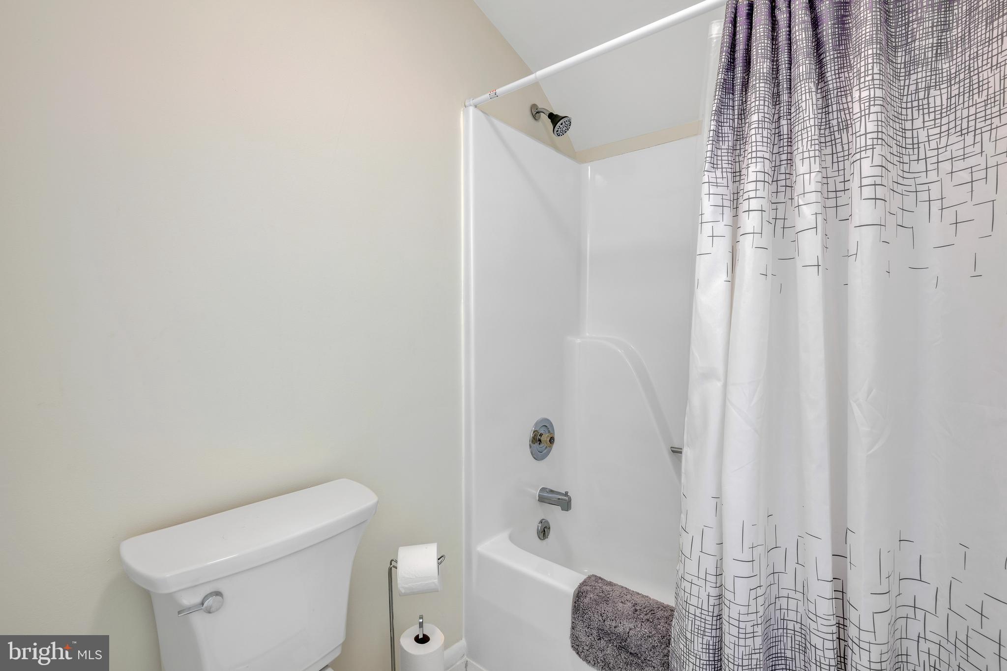 292 Pond Road Millsboro, DE 19966 - Photo 37 of 66 a bathroom with a toilet and shower