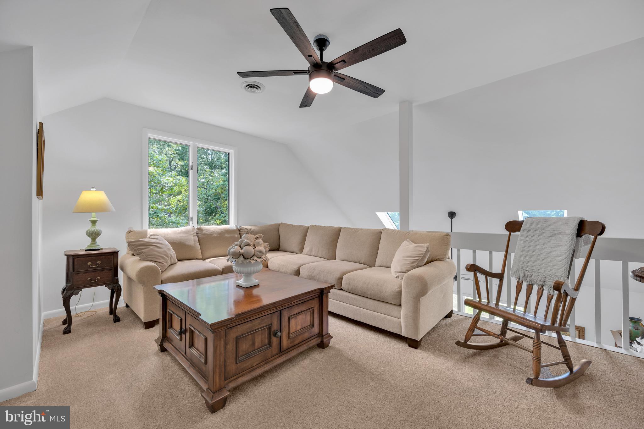 292 Pond Road Millsboro, DE 19966 - Photo 40 of 66 a living room with furniture and a window