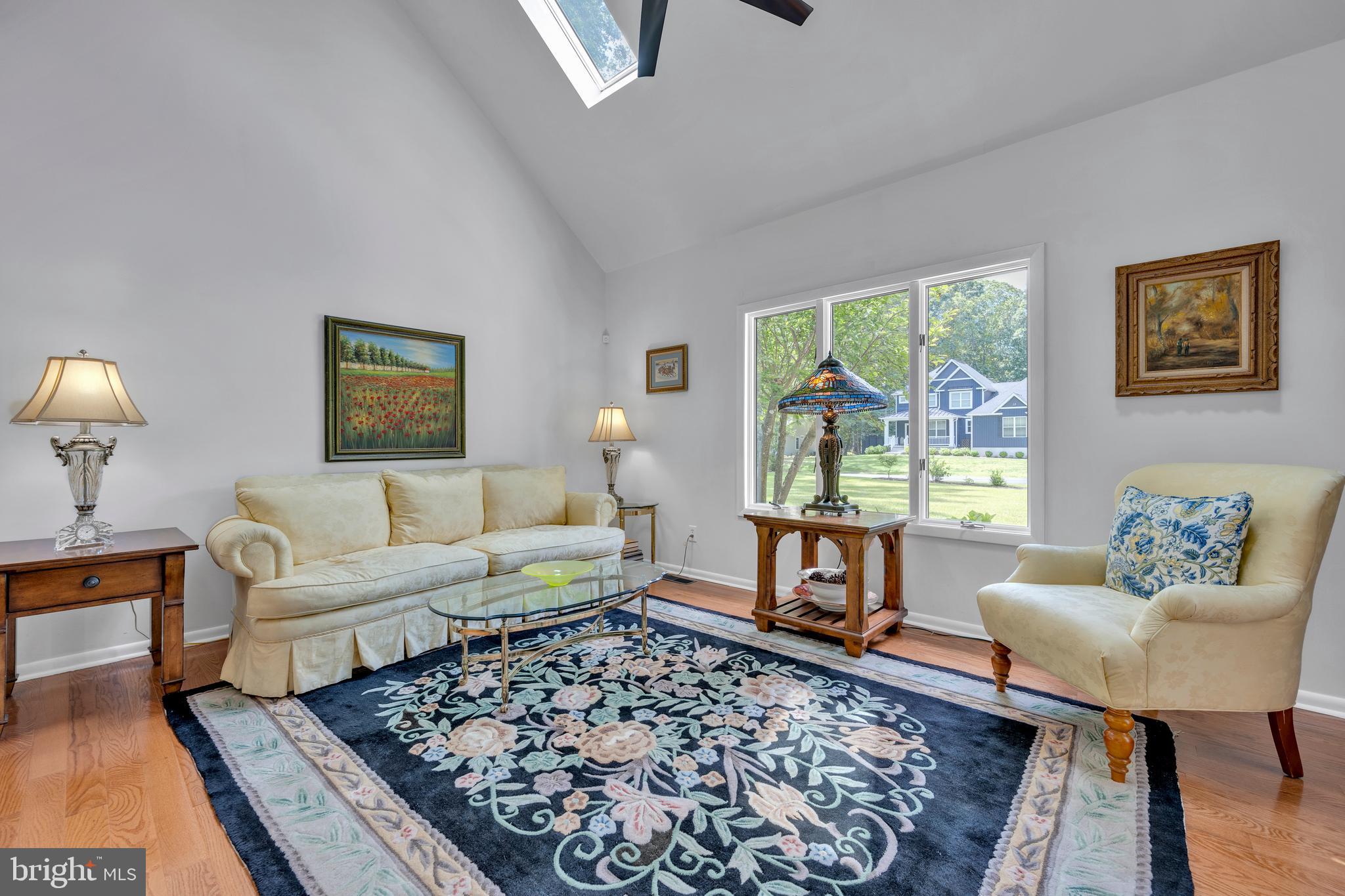292 Pond Road Millsboro, DE 19966 - Photo 4 of 66 a living room with furniture and a rug