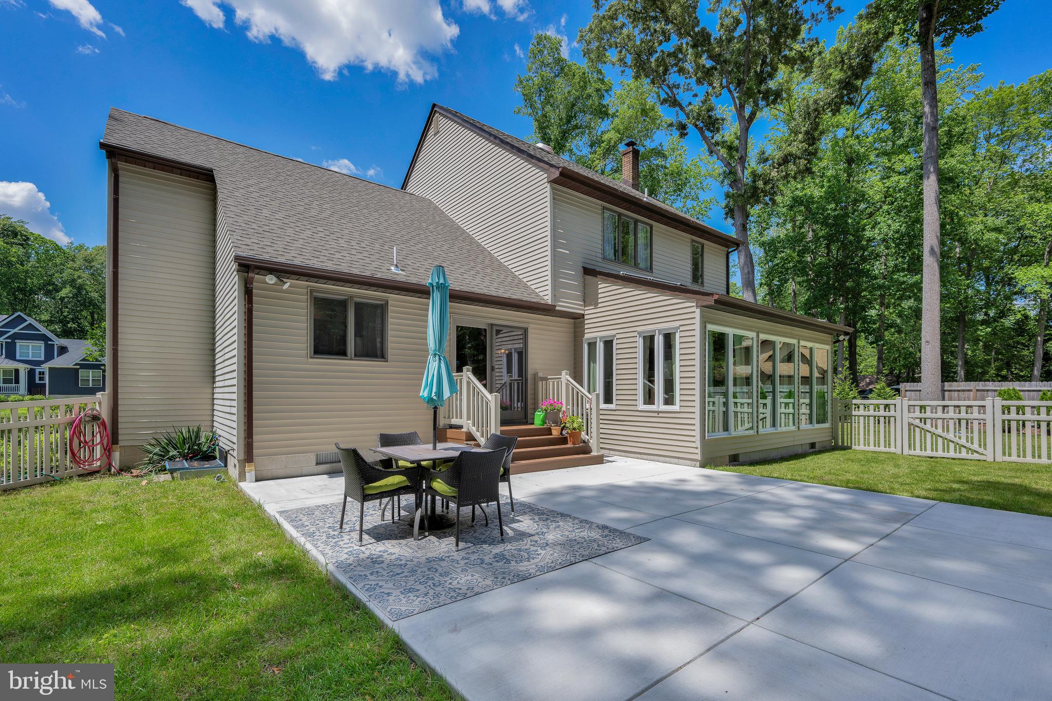292 Pond Road Millsboro, DE 19966 - Photo 42 of 66 a view of a house with a yard and sitting area