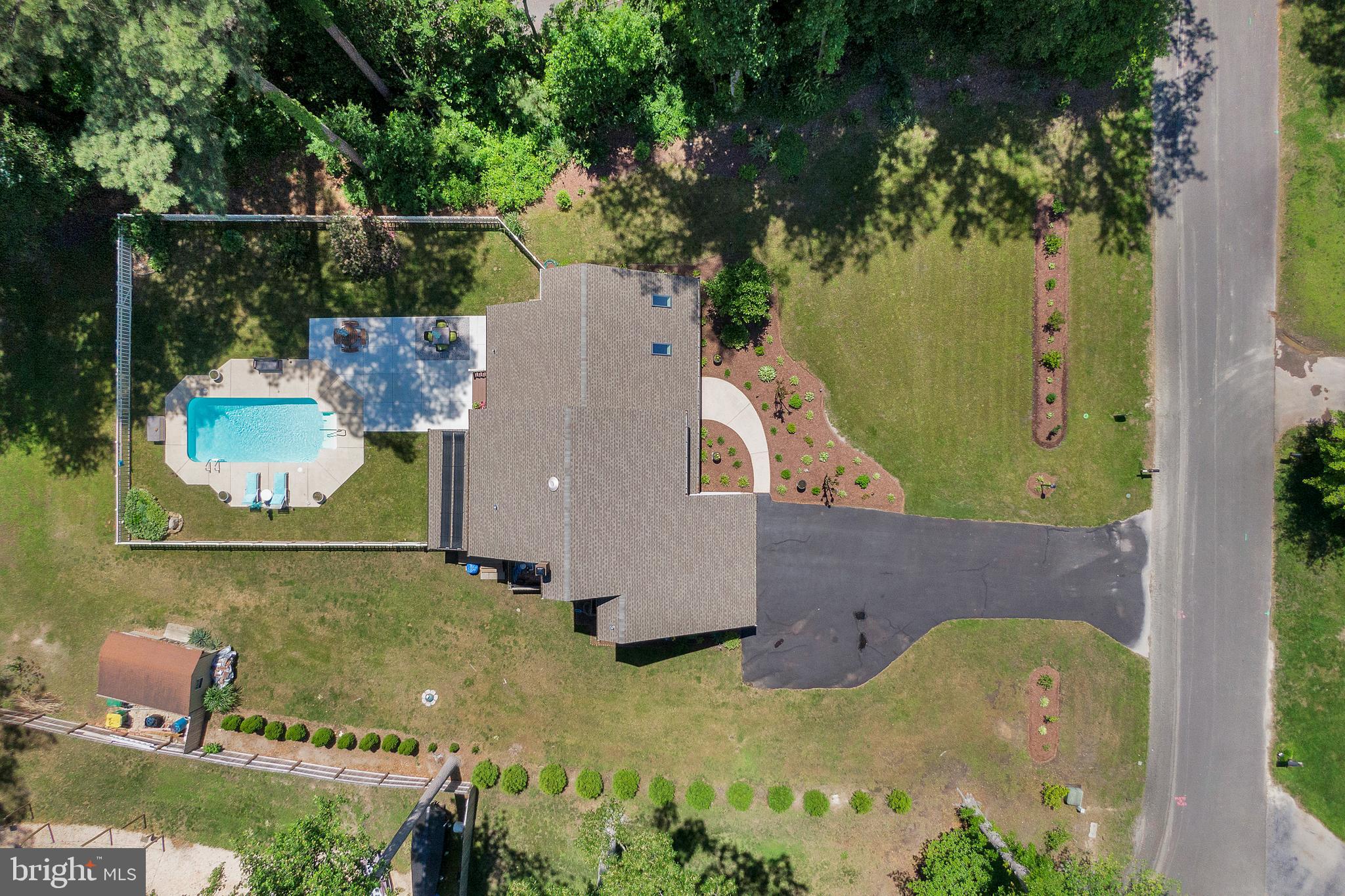 292 Pond Road Millsboro, DE 19966 - Photo 48 of 66 an aerial view of a house with a yard
