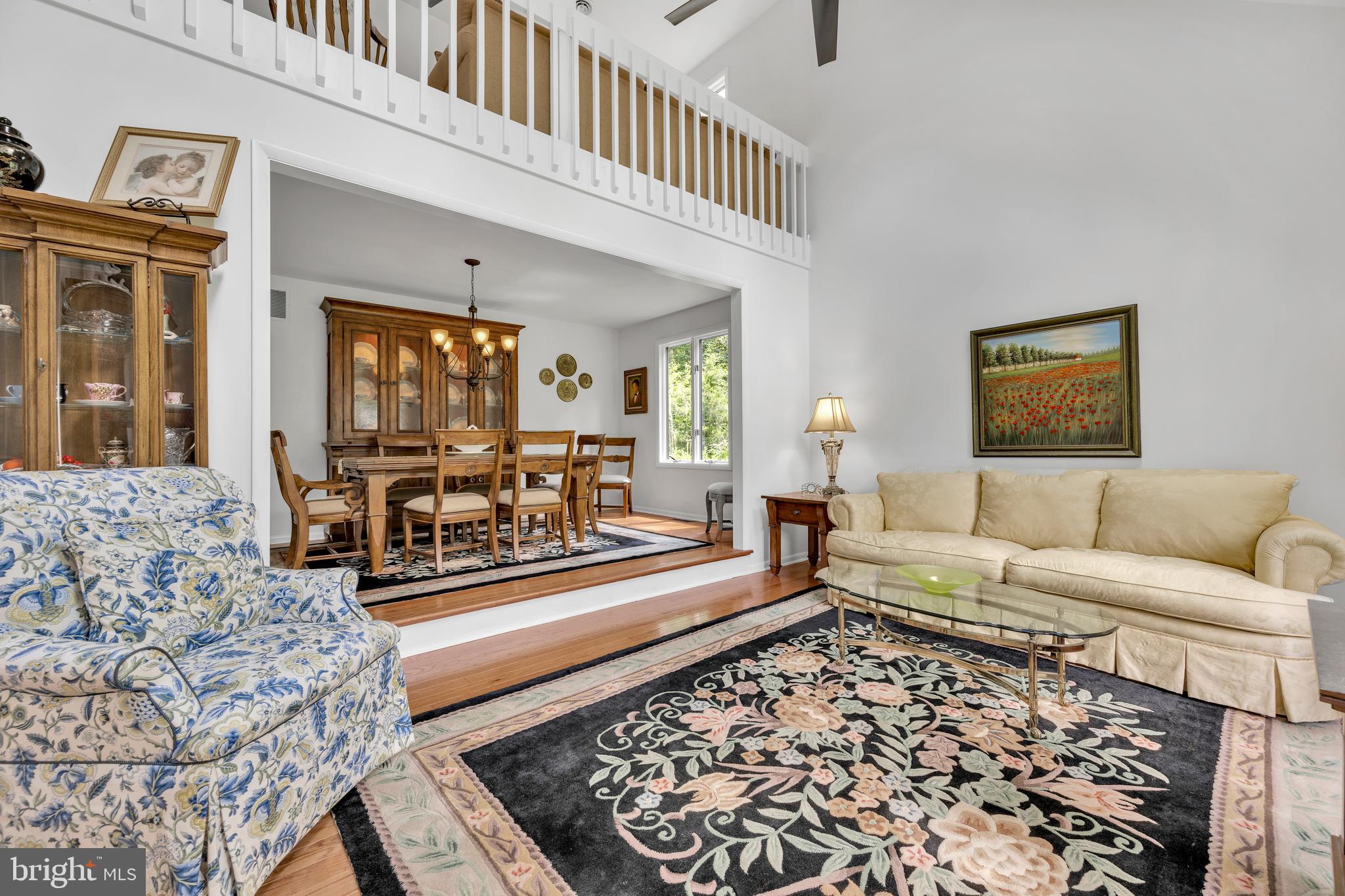 292 Pond Road Millsboro, DE 19966 - Photo 5 of 66 a living room with furniture and a rug