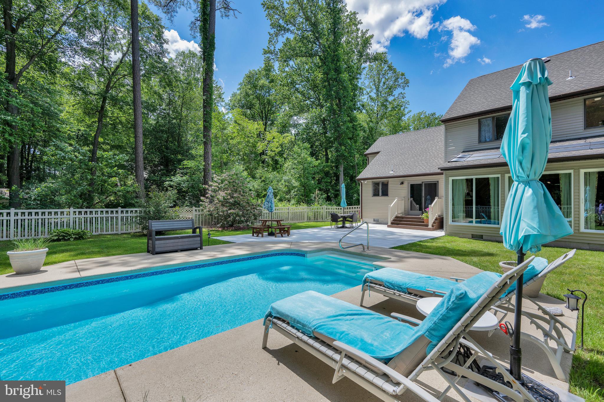 292 Pond Road Millsboro, DE 19966 - Photo 66 of 66 a view of a house with pool and a yard