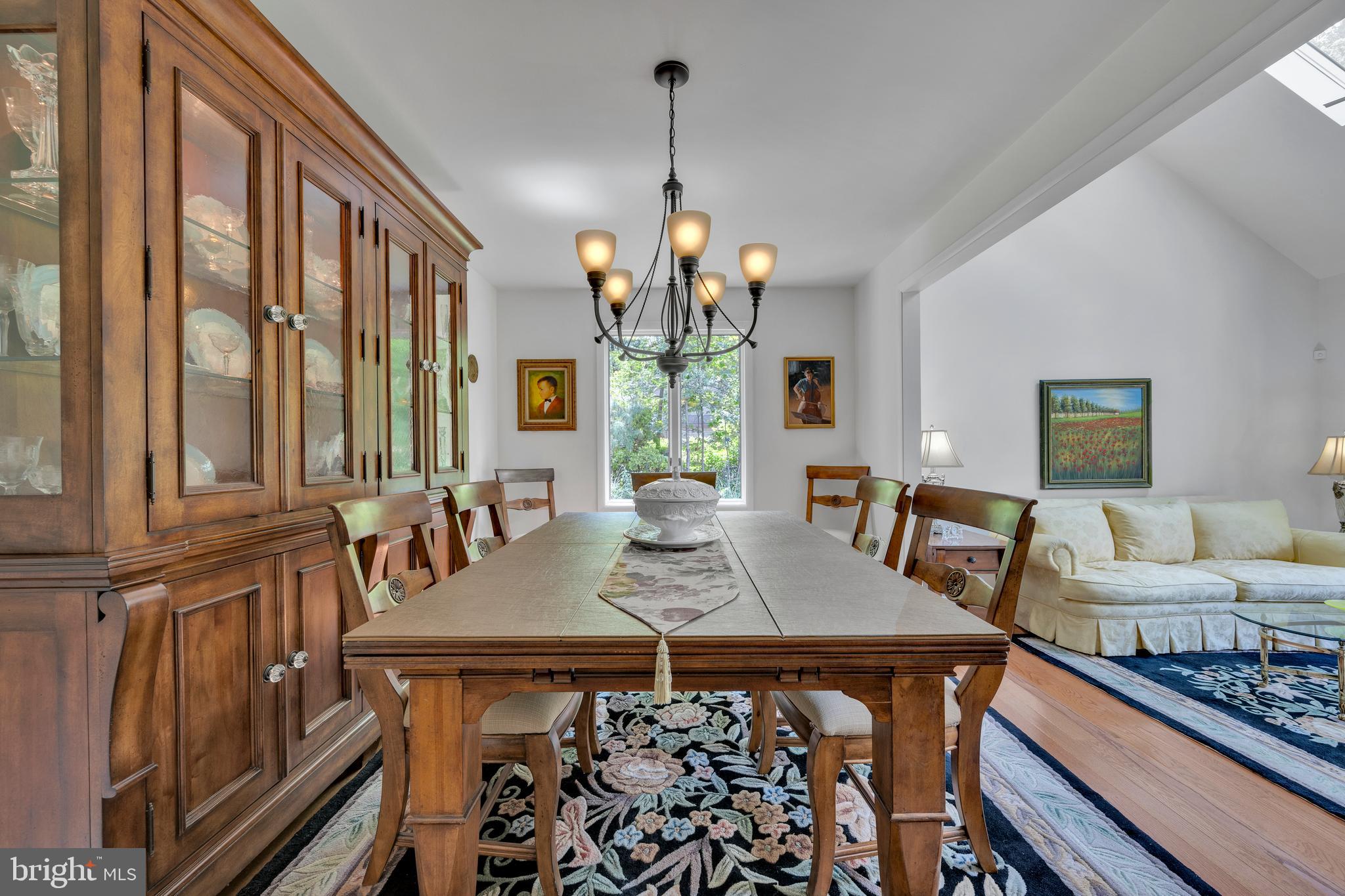 292 Pond Road Millsboro, DE 19966 - Photo 8 of 66 a view of a dining room with furniture window and wooden floor