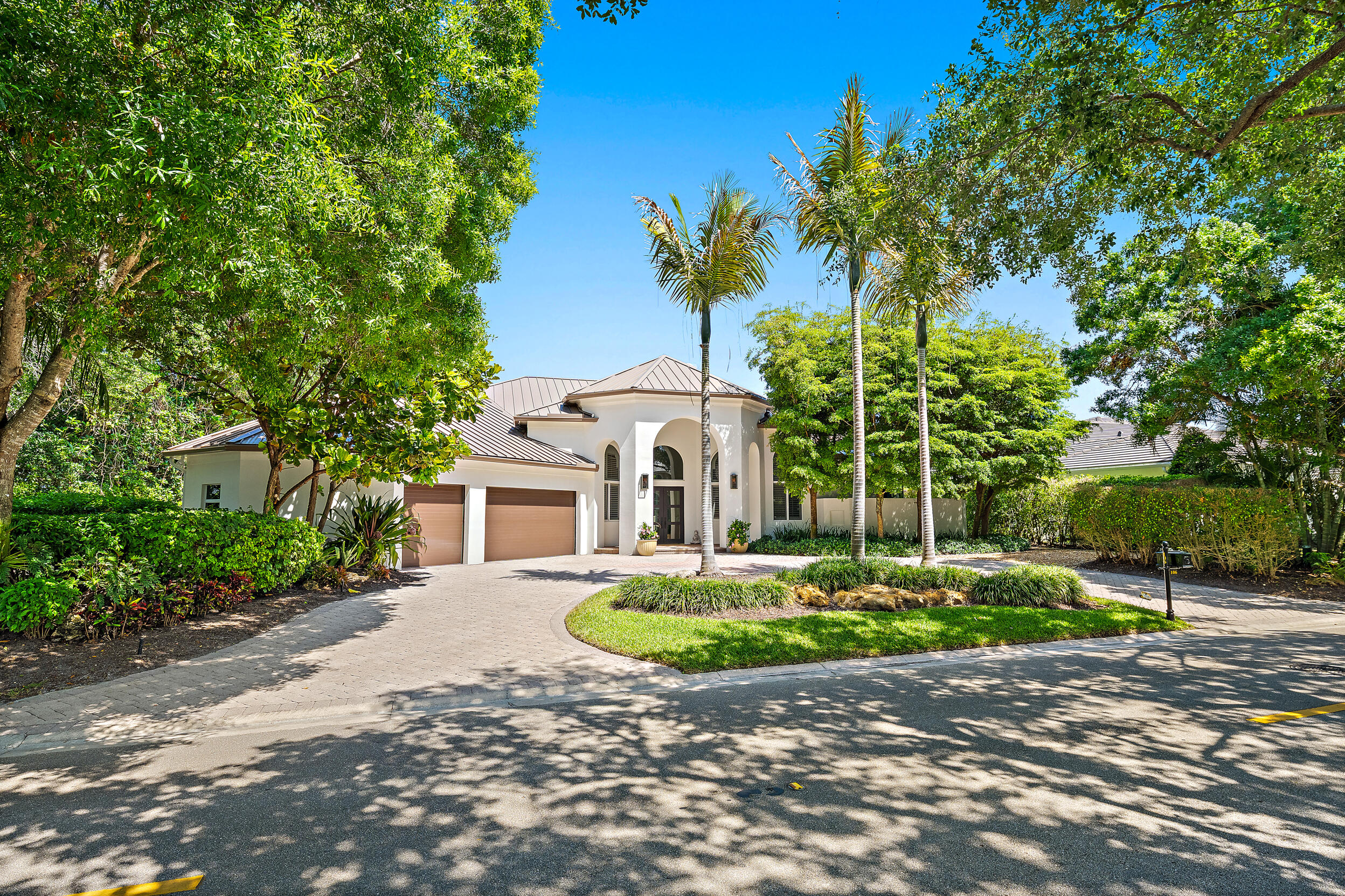 106 Commodore Drive Jupiter, FL 33477 - Photo 2 of 47 Front Elevation