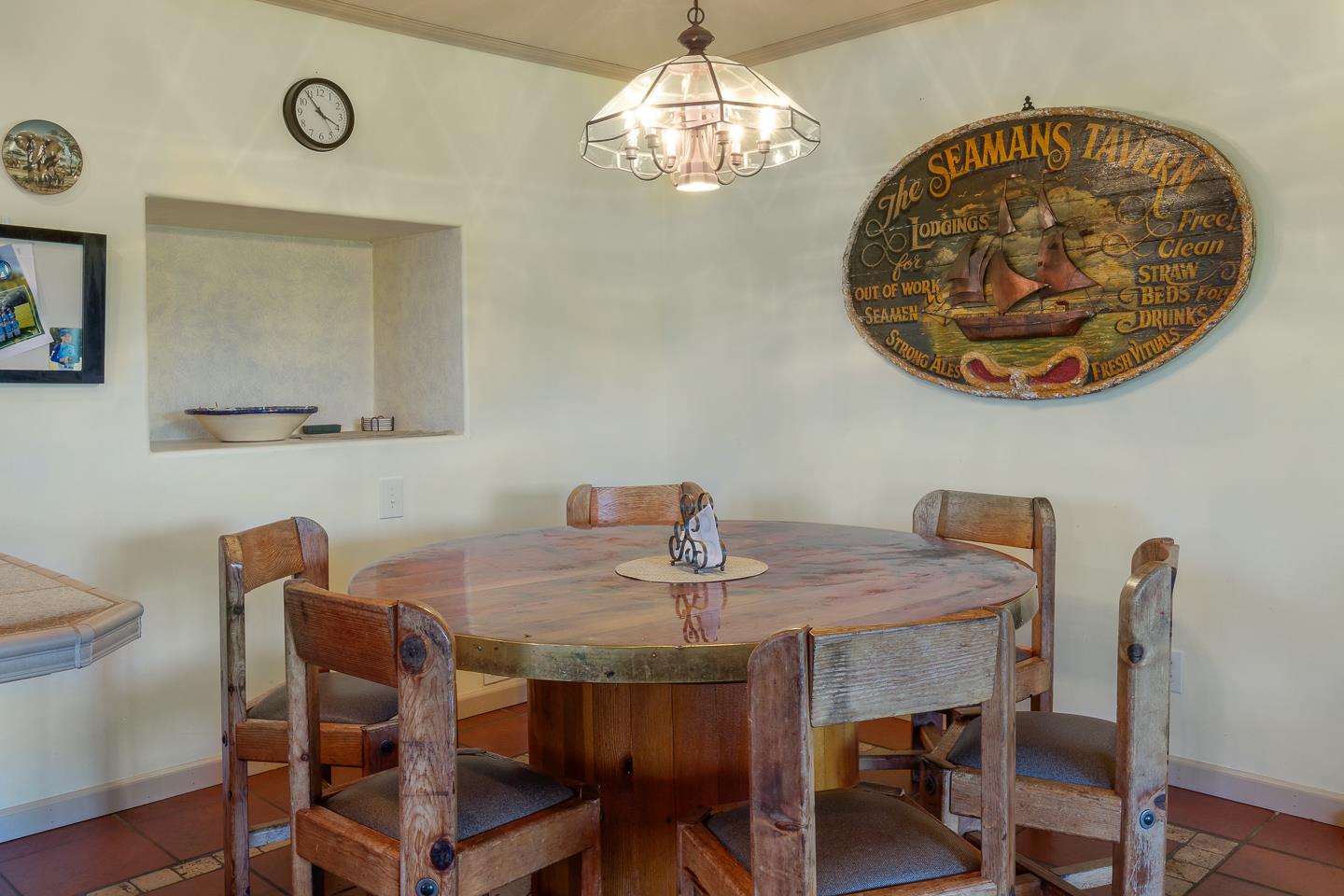 260 Rancho Soquel Drive Soquel, CA 95073 - Photo 31 of 41 a view of a dining room with furniture and chandelier