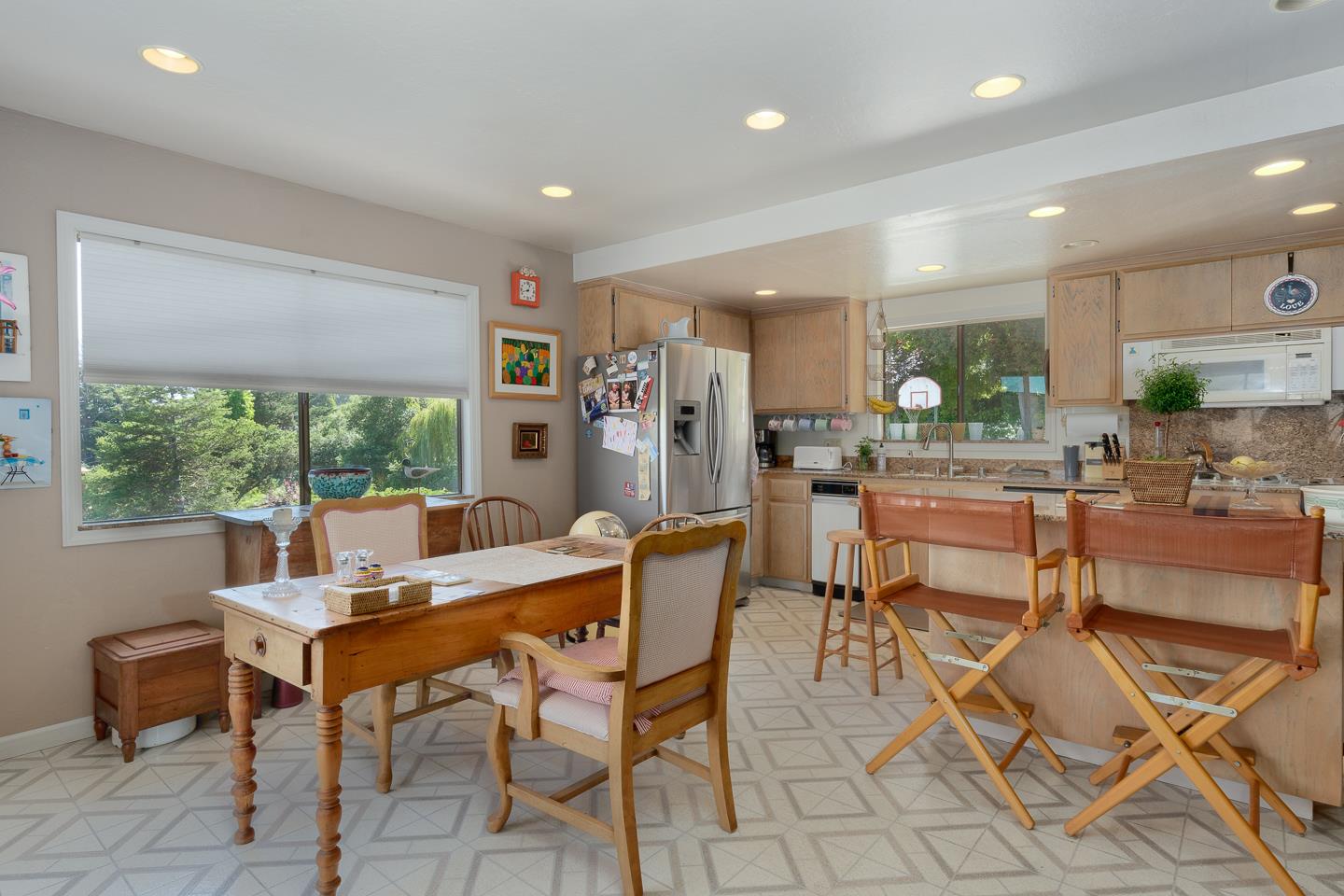 260 Rancho Soquel Drive Soquel, CA 95073 - Photo 10 of 41 a dining hall with stainless steel appliances a dining table and chairs