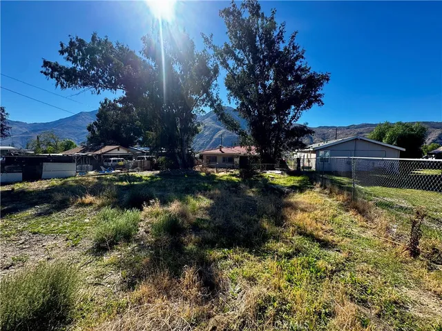 a view of swimming pool with a yard