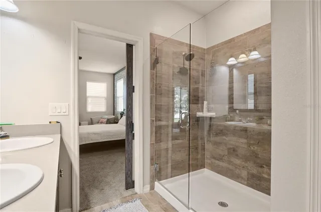 a bathroom with a bathtub and a shower