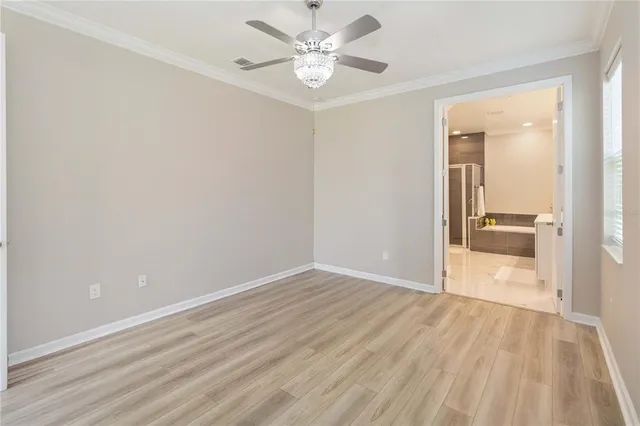 a bathroom with double sink and a mirror