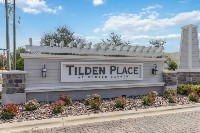 a building with potted plant in front of it