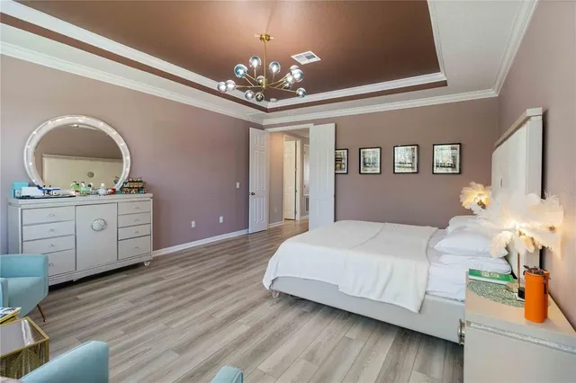 a spacious bathroom with double sink and a mirror