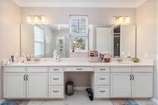a bathroom with a shower and a sink