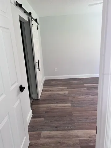 a view of staircase with wooden floor and staircase