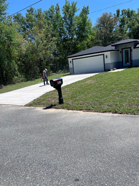 10268 North Harbor Way Citrus Springs, FL 34434 - Photo 4 of 23 a house view with a sitting space