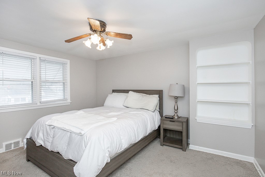 4242 Wyncote Road South Euclid, OH 44121 - Photo 15 of 22 Bedroom featuring ceiling fan and light carpet