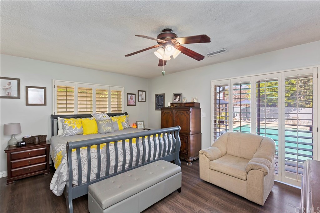 5201 Coventry Drive Riverside, CA 92506 - Photo 13 of 42 a bedroom with furniture and a window