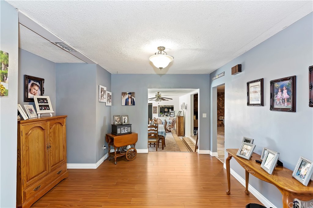 5201 Coventry Drive Riverside, CA 92506 - Photo 18 of 42 a view of a livingroom with furniture and a workspace