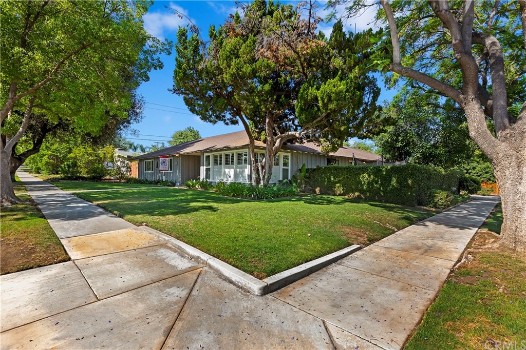 5201 Coventry Drive Riverside, CA 92506 - Photo 2 of 42 front view of a house with a yard