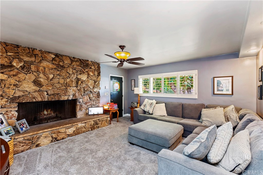 5201 Coventry Drive Riverside, CA 92506 - Photo 24 of 42 a living room with furniture and a fireplace