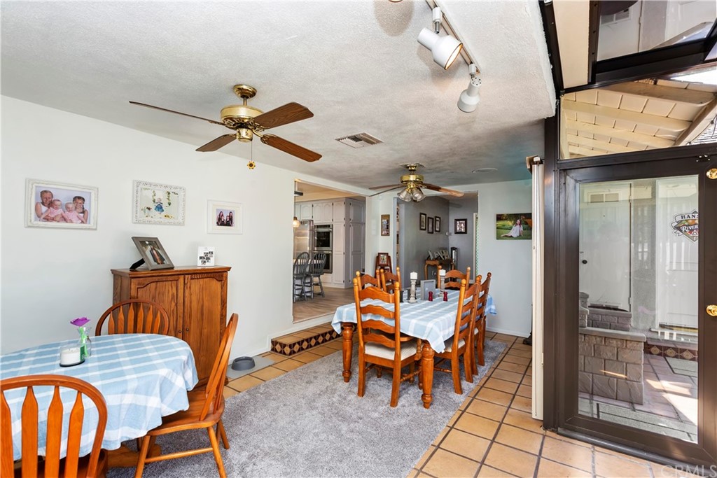 5201 Coventry Drive Riverside, CA 92506 - Photo 27 of 42 a dining room with furniture and window