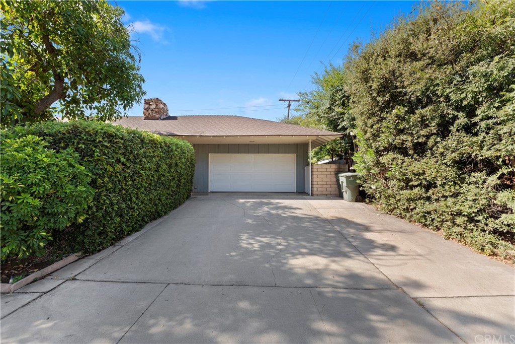5201 Coventry Drive Riverside, CA 92506 - Photo 6 of 42 a front view of a house with a yard