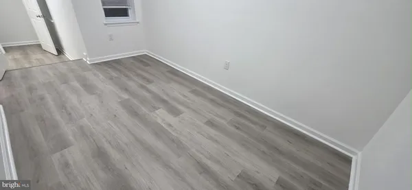 an empty room with a door