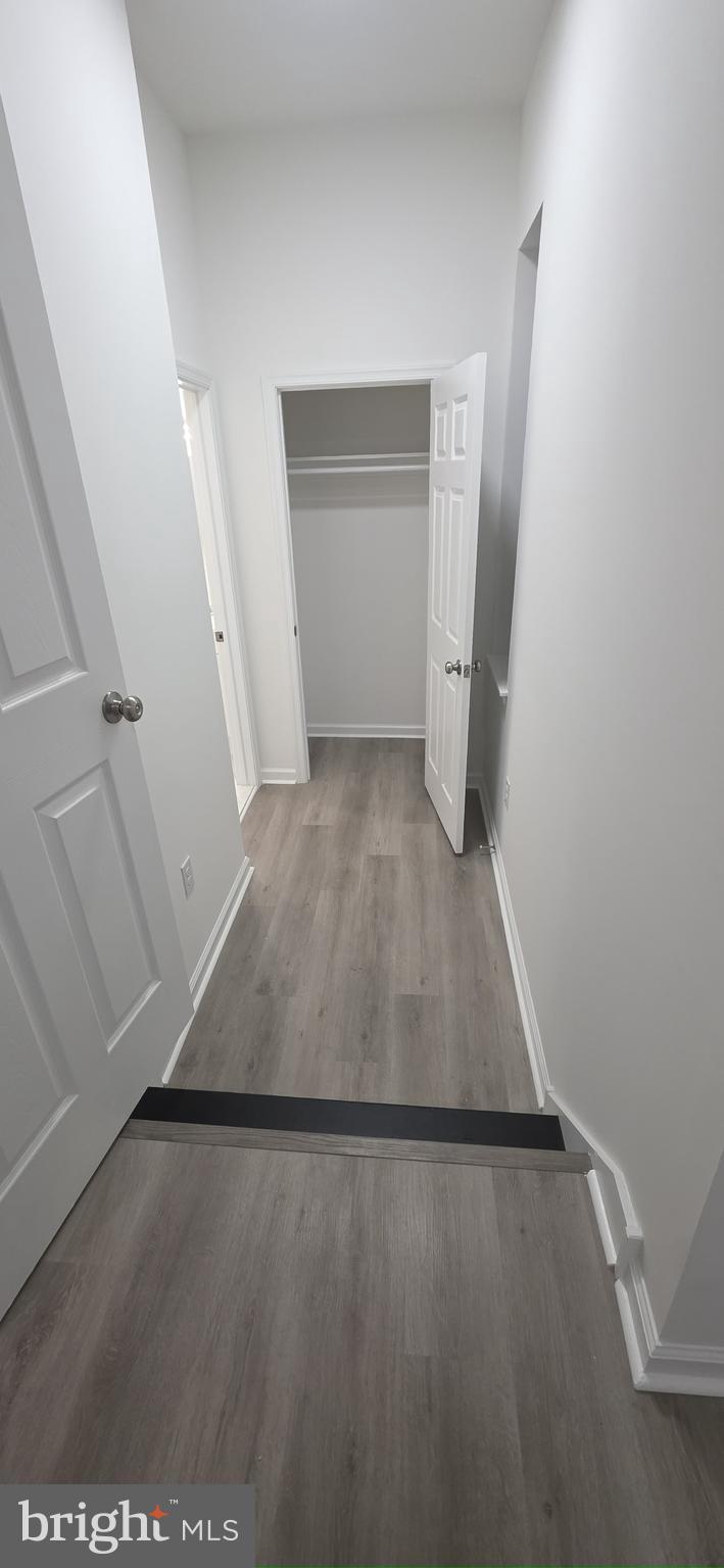 2233 North 16th Street Philadelphia, PA 19132 - Photo 17 of 27 an empty room with a door