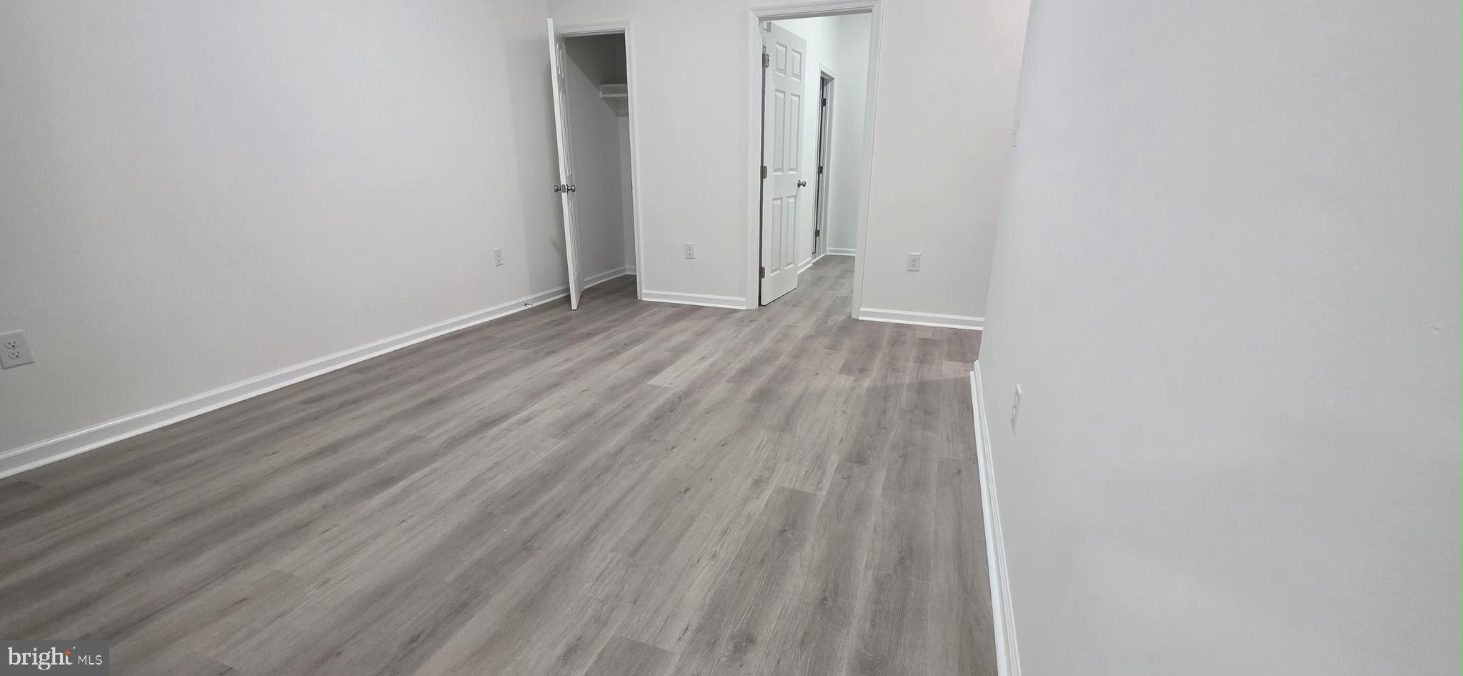 2233 North 16th Street Philadelphia, PA 19132 - Photo 4 of 27 a view of a room with wooden floor