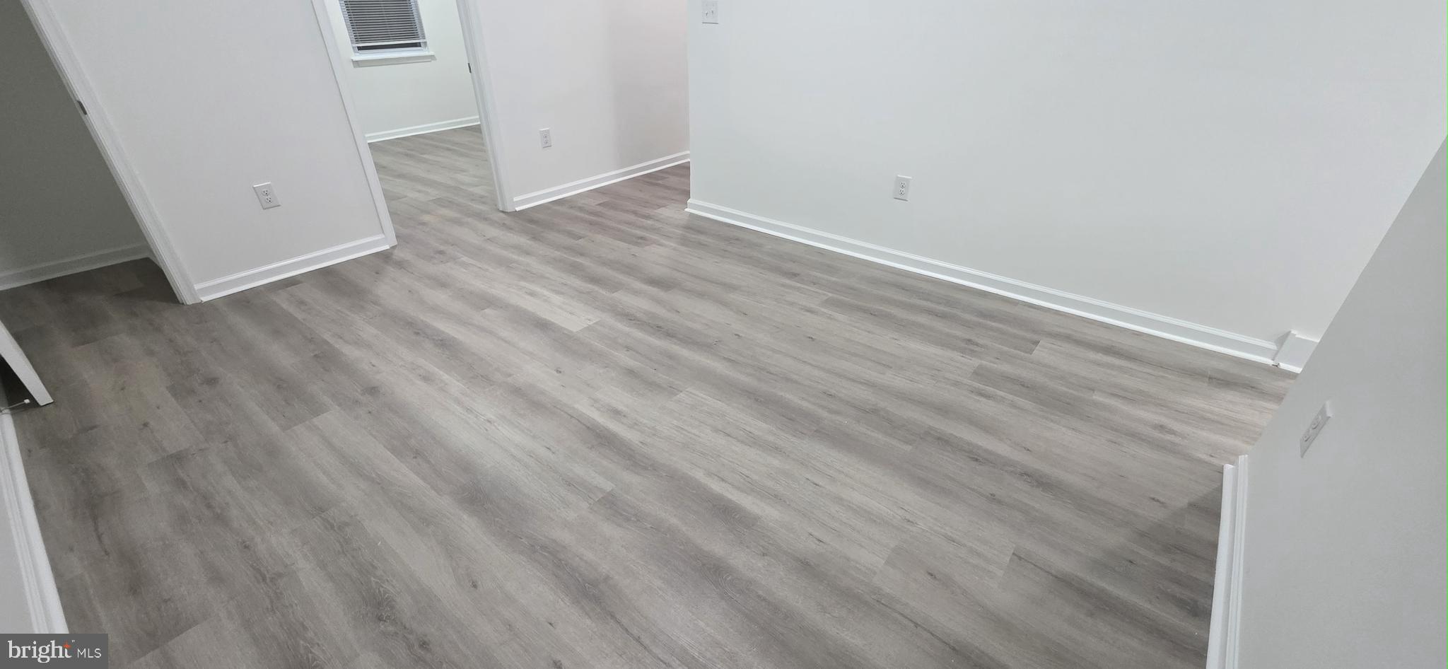 2233 North 16th Street Philadelphia, PA 19132 - Photo 7 of 27 wooden floor in a white room